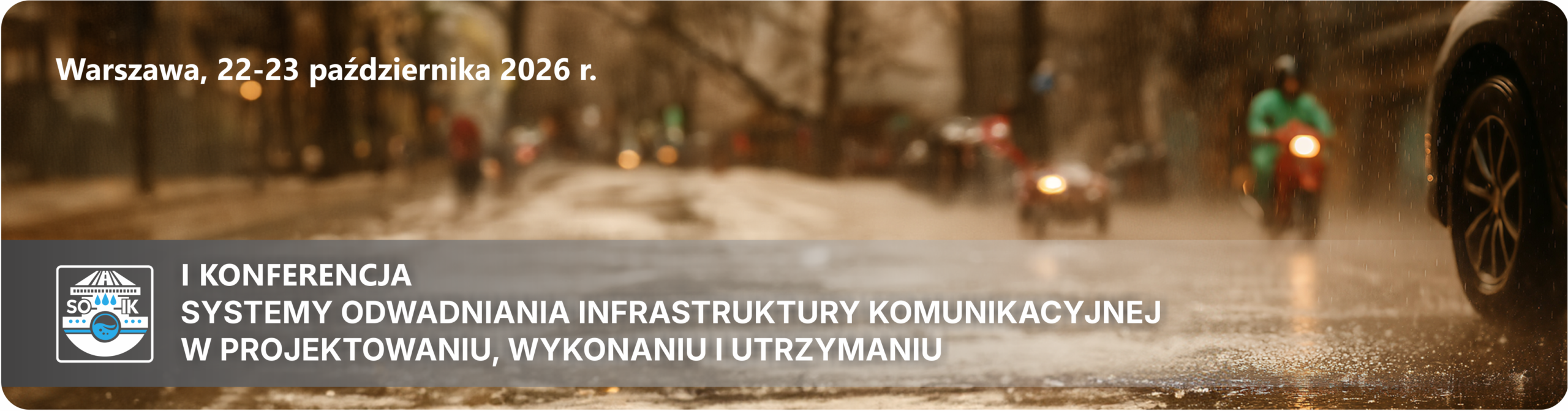 Grafika aktualności Konferencja SOIK2026, po prawej stronie w górnej części logo Konferencji w lewej dolnej części tytuł Konferencji, w tle widoczna droga z widocznym kołem samochodu w takcie padającego deszczu, dolna część zdjęcia z droga zakończona granatowym cieniowanym paskiem